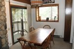 Mammoth Lakes Rental Sunshine Village 138 - Dining Room with Slider to Outside Balcony